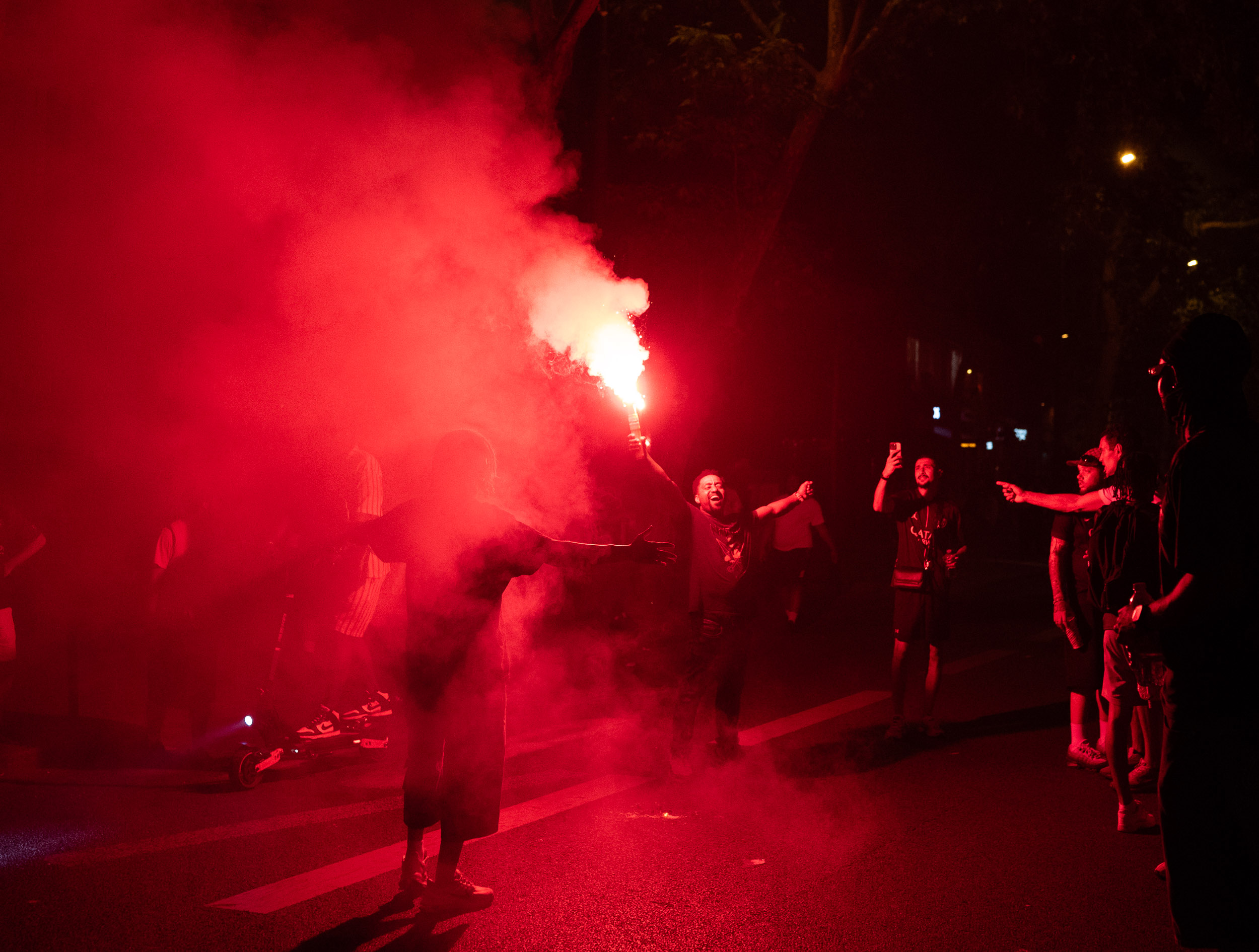 PSG supporters celebrating the UEFA Champions League win in Paris, June 2026.