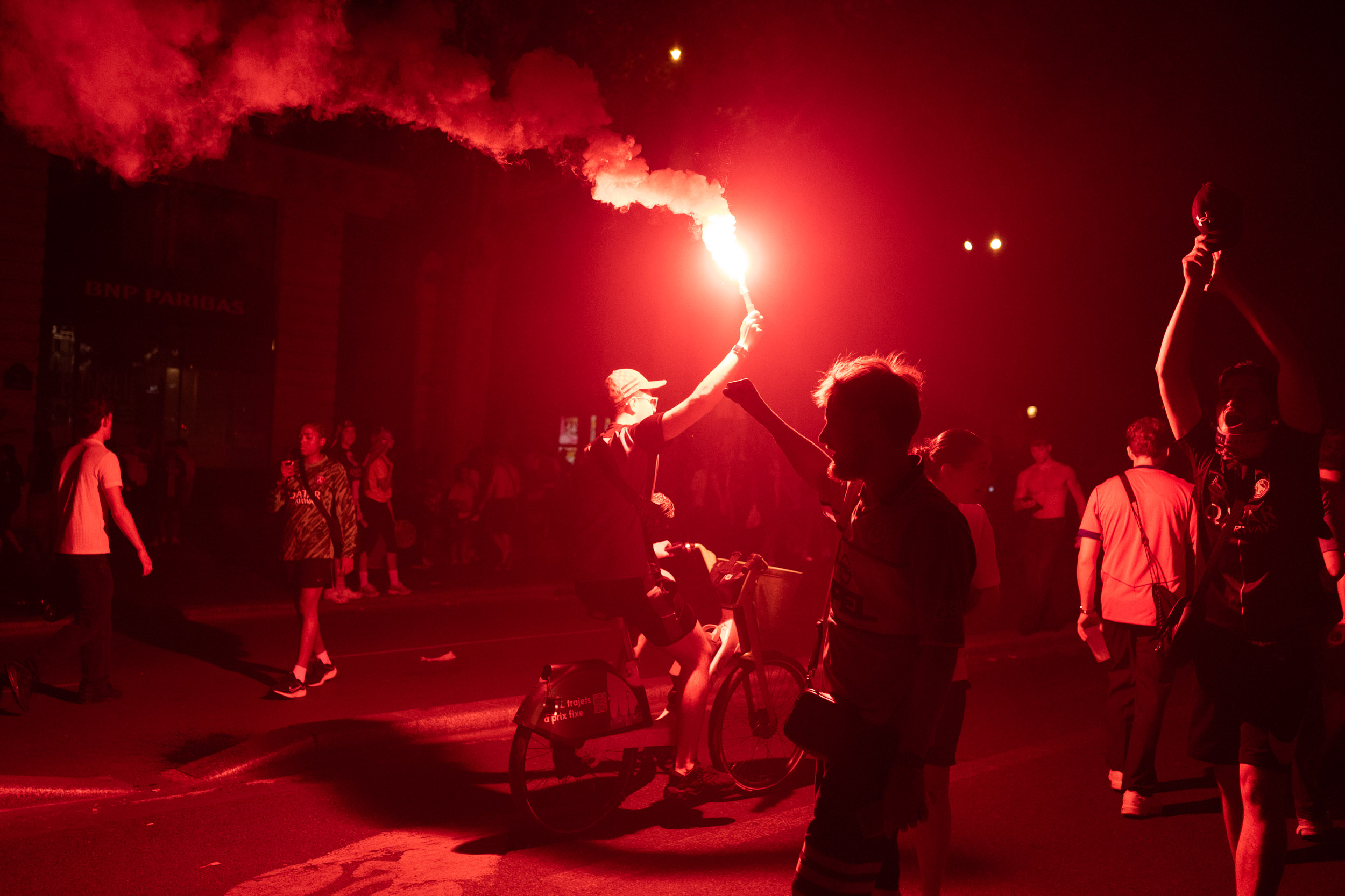 PSG supporters celebrating the UEFA Champions League win in Paris, June 2026.